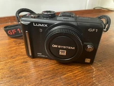 Panasonic LUMIX DMC-GF1 12.1MP 4/3 Lens Digital Camera: Body Only Black