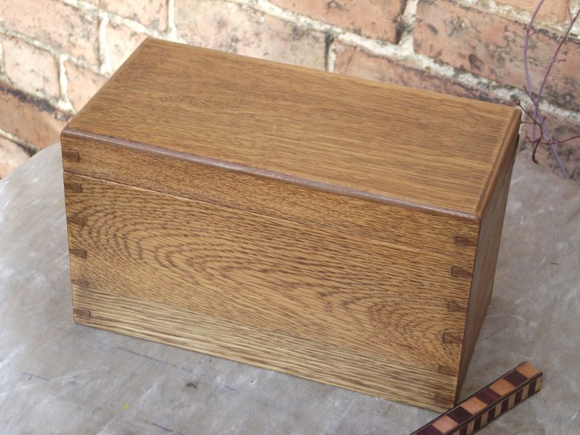 Golden oak lidded storage box with doves tails and strong lining Golden oak lidded storage box with doves tails and strong lining