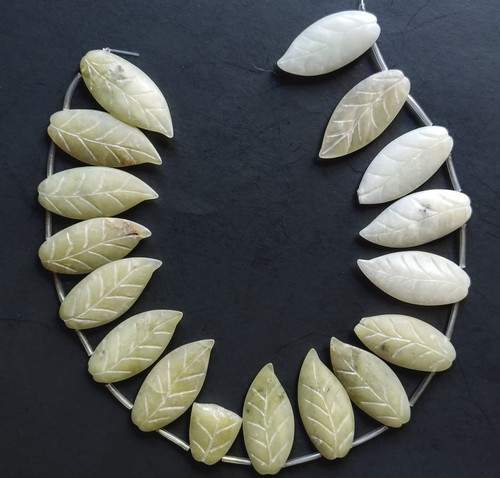 Strand Of 16 Hand Carved 1.5in Leaf Shaped Light Olive Green Stone Beads