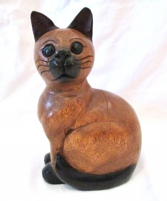 tall wooden carved cats