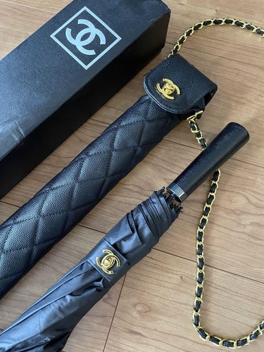 CHANEL Paraguas Plegable Negro Marca Coco Acento Dorado De Colección para Mujer Moda - Imagen 8 de 12