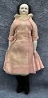 New ListingAntique Doll Black Hair White Face Blue Eyes Pink Dress Pre 1870s