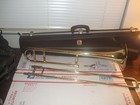 OLDS AMBASSADOR TROMBONE WITH ORIGINAL CASE AND 12 C MOUTHPIECE