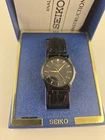 NEW OLD STOCK Seiko Watch Womens Black Gold Tone Quartz 7N01-7041
