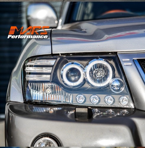 Black High Power LED Angel-Eyes Head lights for MITSUBISHI PAJERO 2000-06 NM NP - Picture 10 of 13