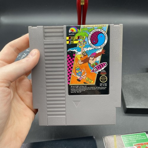 T&C T C Surf Designs Wood & Water Rage Nintendo NES CIB completo di scatola con manuale - Foto 12 di 16