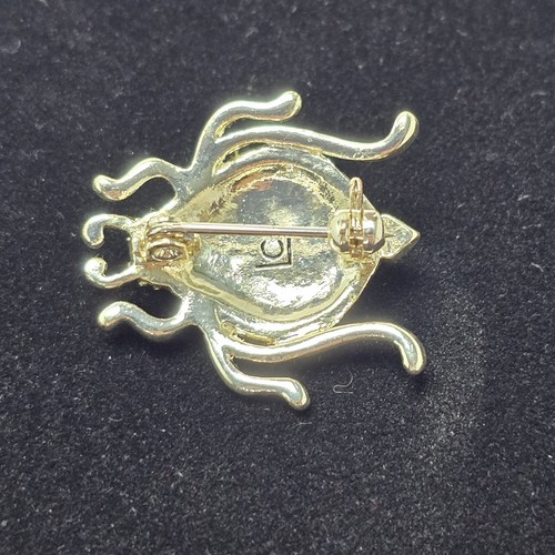 Broche prendedor Liz Claiborne escarabajo tono plateado piedra azul y gemas azules - Imagen 2 de 3