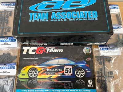 Associated RC10 TC6.1 Factory Team, Handbuch, Box, Ersatzteile, Federn usw.