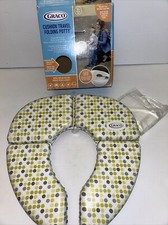 Cushion travel folding potty by Graco