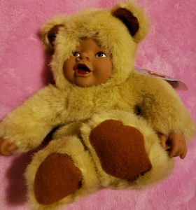 baby doll and teddy bear