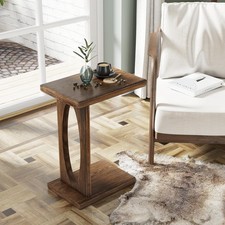 A small snack coffee table with a wooden frame, in warm brown wood color