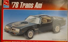 AMT/ERTL 1:25 scale model kit for a 1978 Pontiac Firebird Black Trans Am Sealed