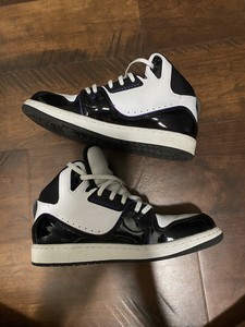 black and purple jordan flights