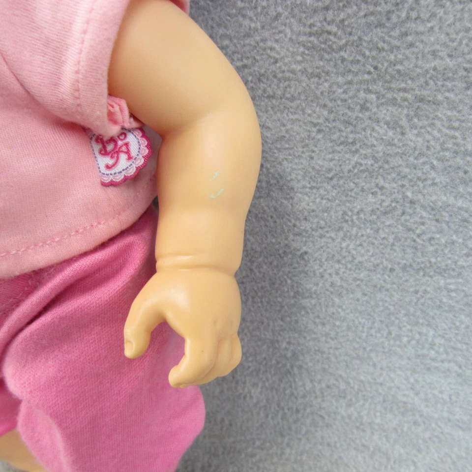 Muñeca interactiva Hasbro Baby Alive Wets N Wiggles de colección 12 pulgadas Foto 4 de 4
