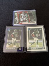 2021 Panini Donruss Optic Elijah Moore Red Hyper Relic/Purple Shock/Base Rookies