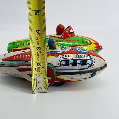 SET OF 2 VINTAGE ATOMIC RETRO METAL TIN ROCKET RACER SET OF 2 VINTAGE ATOMIC RETRO METAL TIN ROCKET RACER