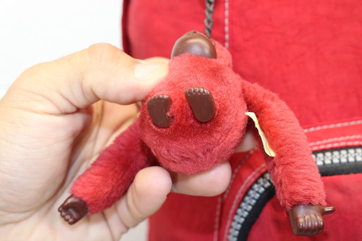 Backpack with cheap gorilla keychain