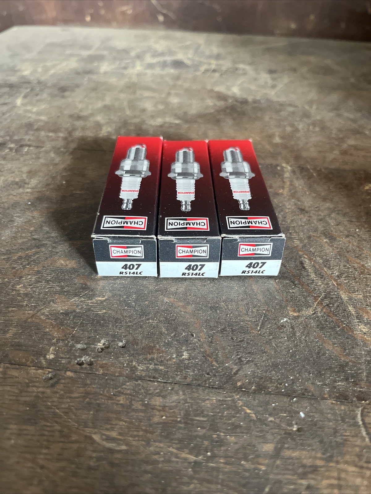 3 NOS Champion 407 RS14LC Copper Plus Spark Plugs
