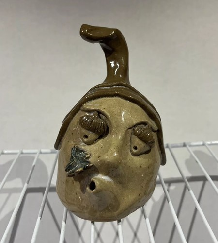 Acorn Head Blowing Away A Leaf From His Face Made Of Clay - Picture 1 of 5