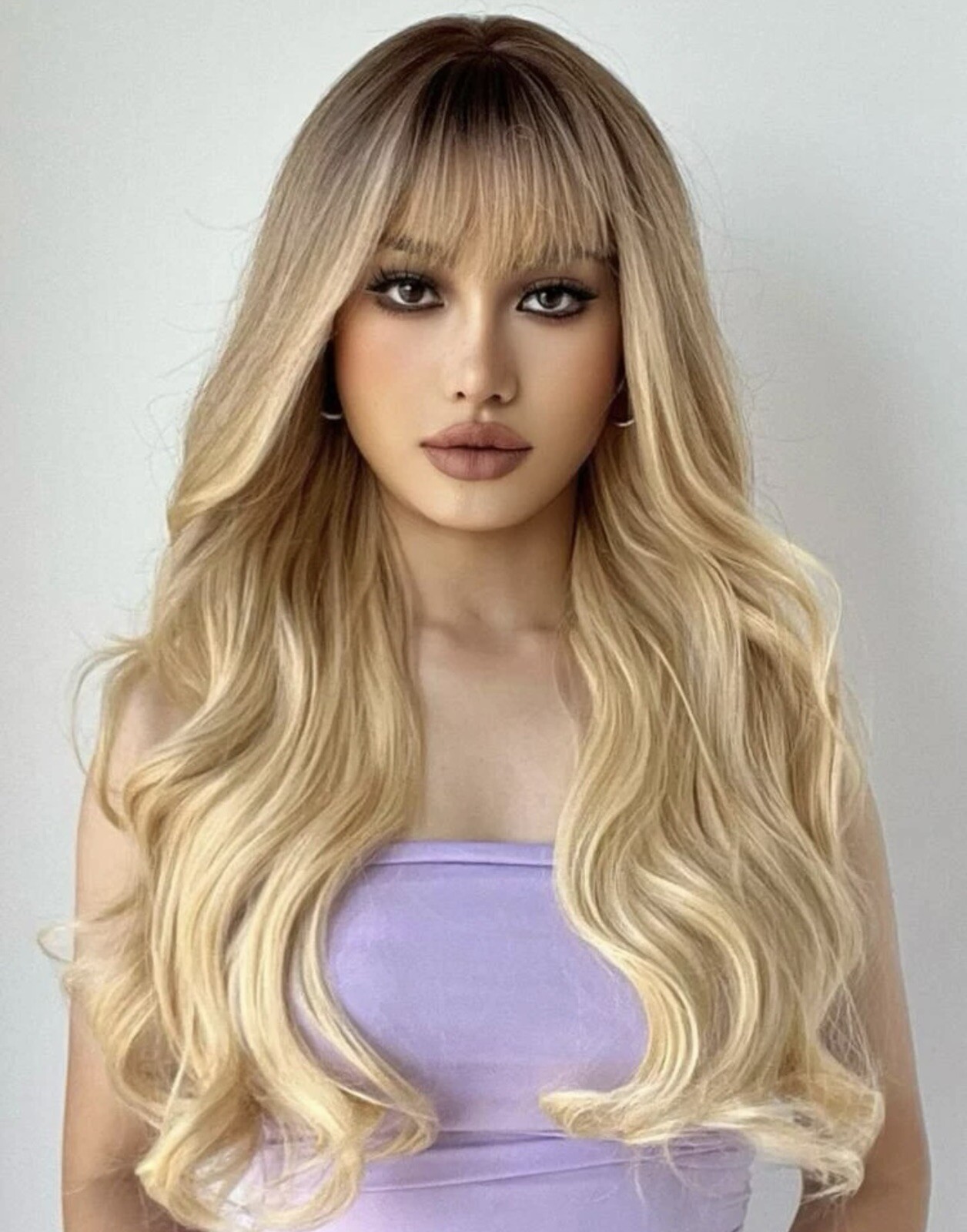 Perruque synthétique blonde longue : oubliez les décolorations avec ce kit ondulé
