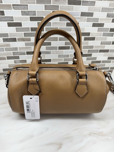 GUESS SADDLE TAN BARREL BAG CHERRY CRARM CROSSBODY/SHOULDER BAG - Picture 6 of 9