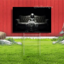 Creepy doll on the couch Halloween yard sign