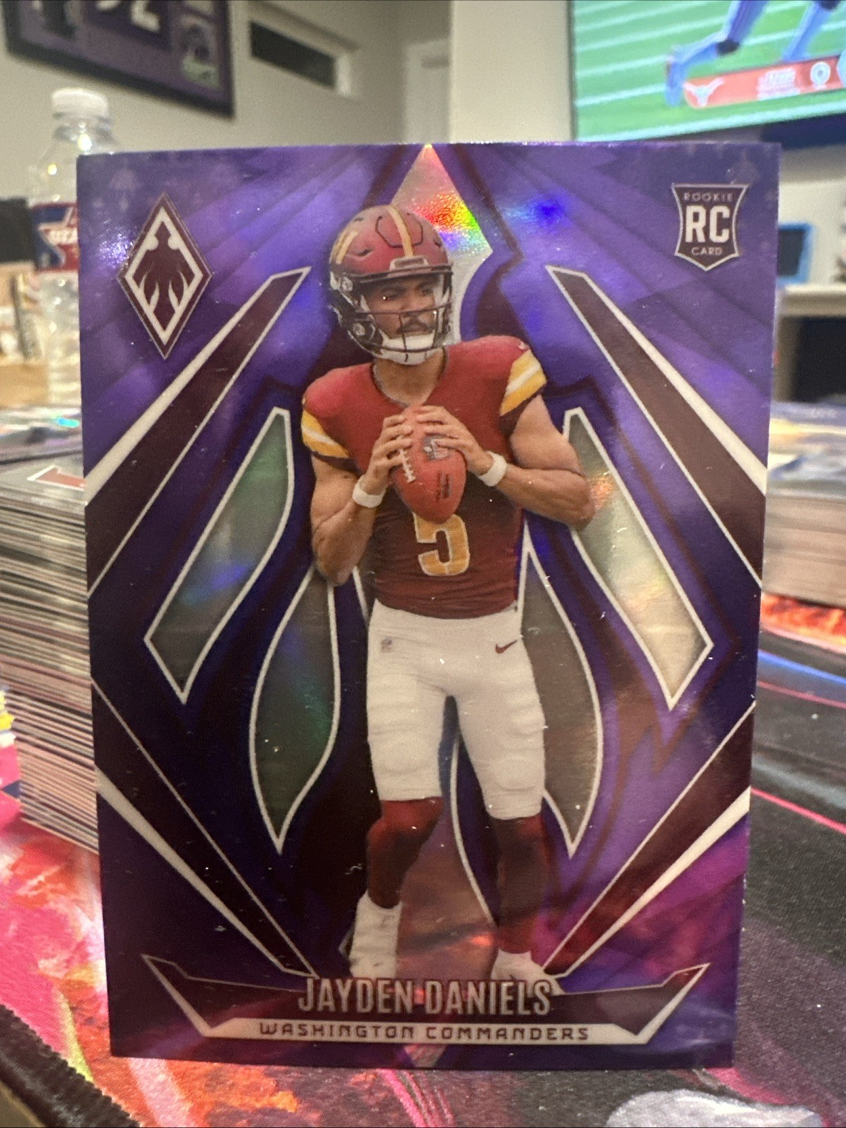 2024 Panini Phoenix - Rookies Jayden Daniels #198 Purple (RC)