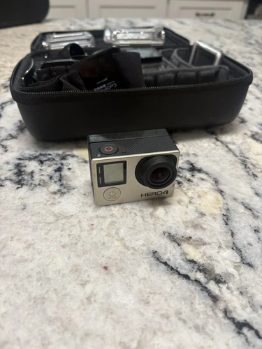 GoPro HERO4 Action Camera - Silver With Attachments And Extra Sim Card