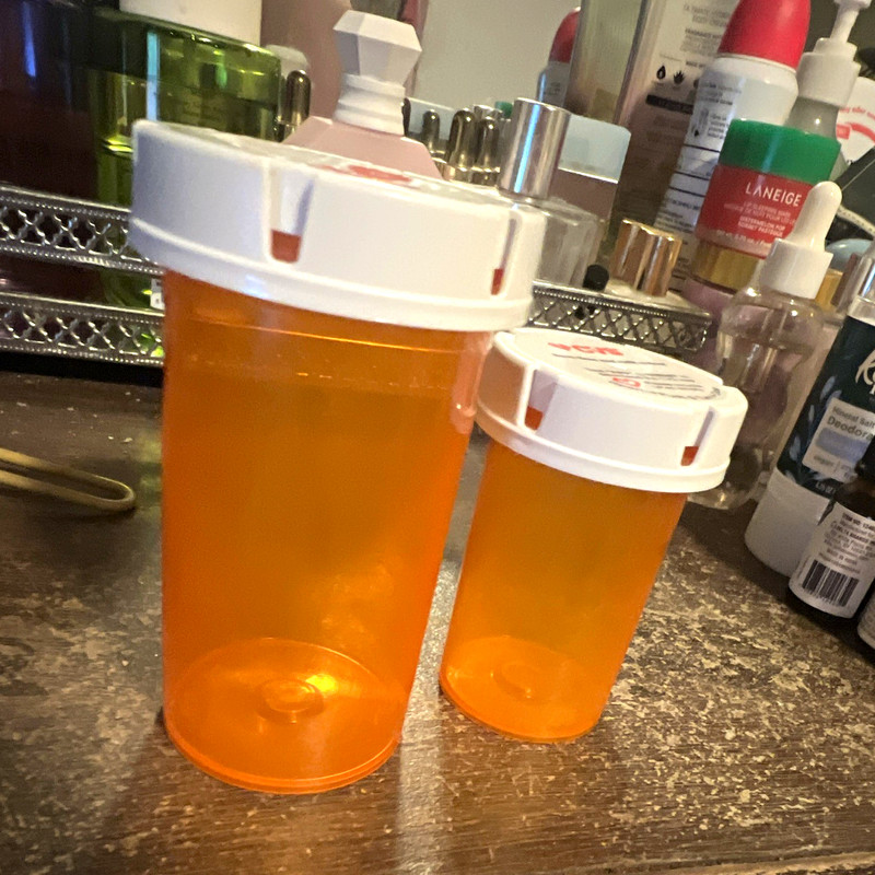 Over 200 Orange Plastic Prescription Pill Bottles in bulk a mixed of sizes