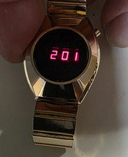 VINTAGE UIT (1977-82) RED LCD QUARTZ WATCH FULLY FUNCTIONING, NEW BATTERIES