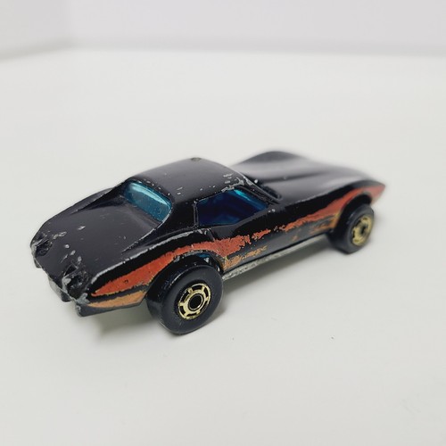 Hot Wheels Chevrolet Corvette Stingray 1975 Base Black Orange Red Yellow Stripe - Picture 4 of 11