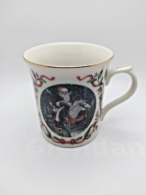 Lenox ''The magic of Christmas mug 1997-9 Oz  Full--3 3/4''H-3 1/4''W
