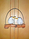HAND CARVED ALBESIA WOOD BIRDS ON A DRIFTWOOD & METAL SWING