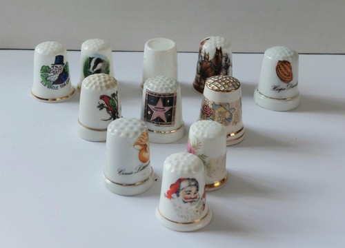 11 Collectable thimbles, various themes, china, excellent condition
