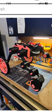 dog wheelchair slightly usedred and black holds-up to 60 lbs adjustable legs