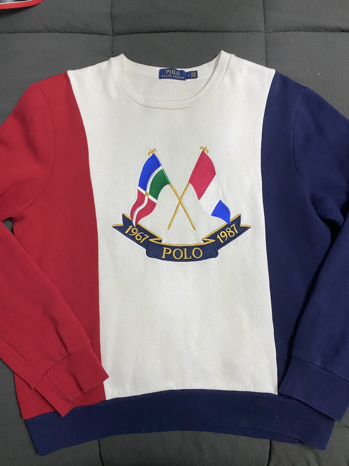 purple and yellow sweatshirt
