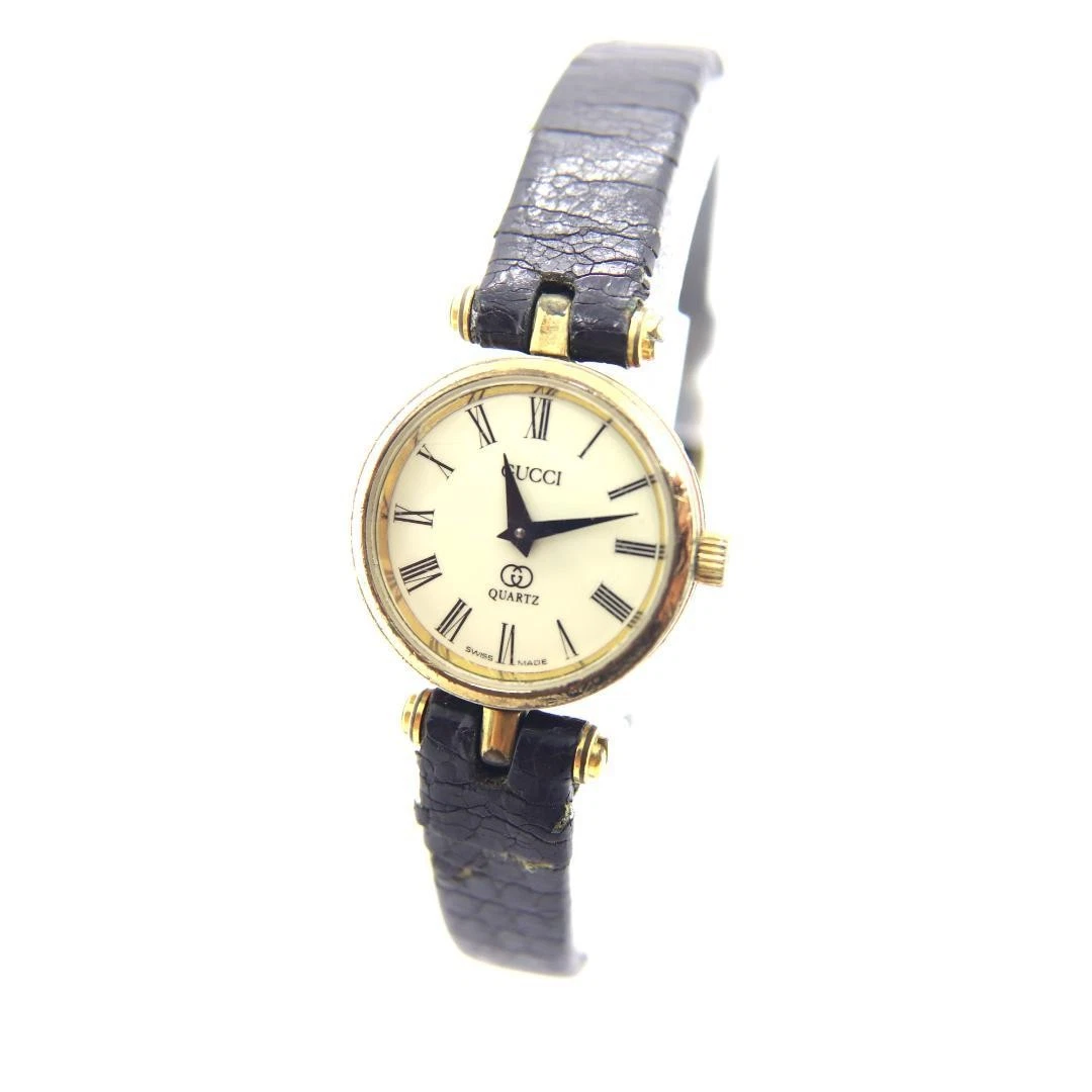 Montre Gucci Sherry Line ronde pour femme fabrication suisse quartz blanc 21 mm vintage