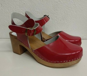 red heeled clogs