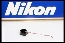208291 NIKON EM BATTERY CHAMBER REPAIR PART USED part 23FB-A11