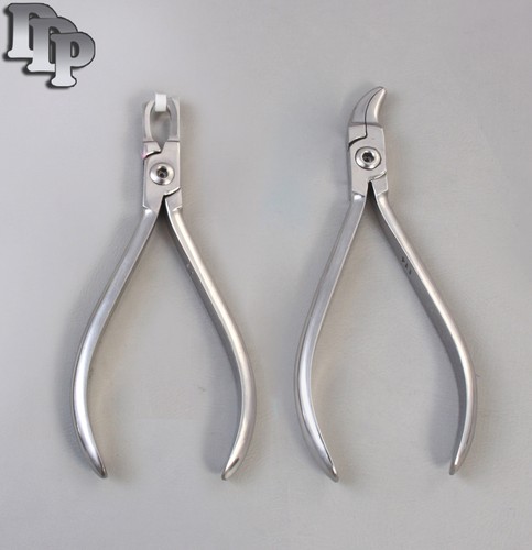 2er Set Reynolds Konturenzange & Hinterband Entfernungszange Dental - Bild 1 von 2
