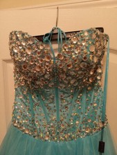 Beautiful blue dress with a heart shaped beaded top.