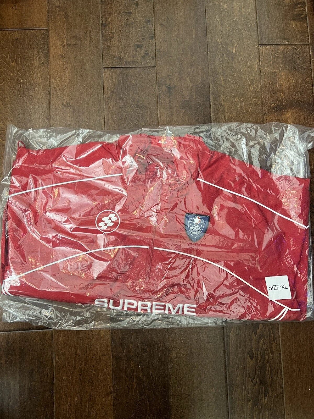 Pull Supreme FW24 Reflective Piping Poly rouge taille XL neuf EN MAIN