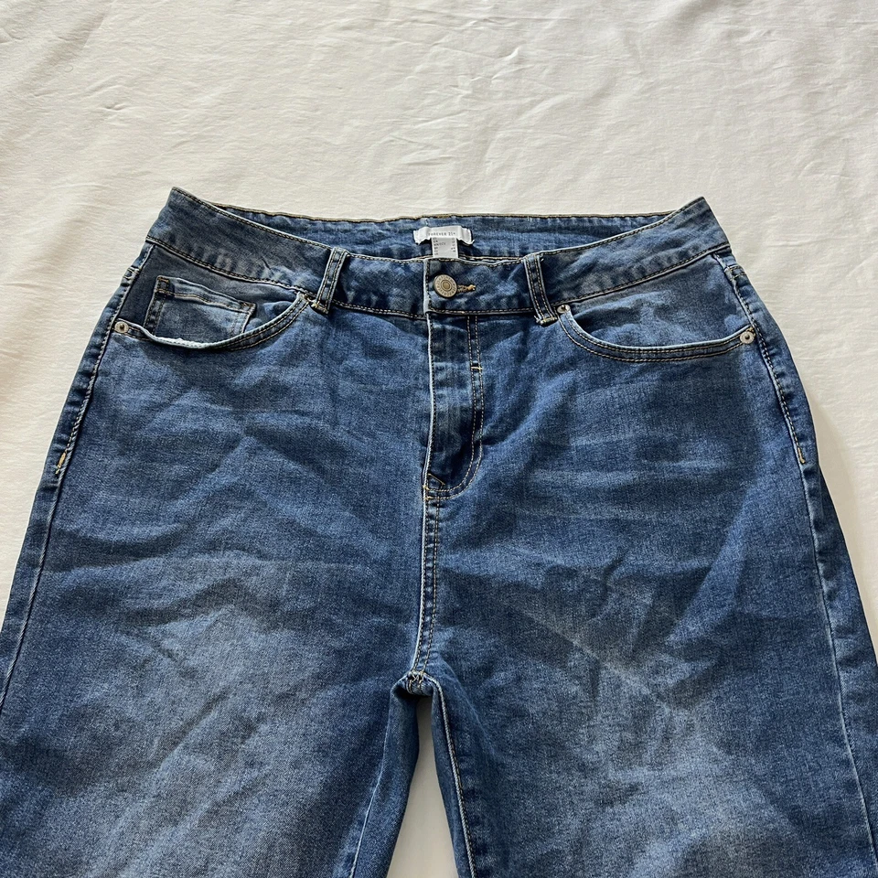 Pantalones de mezclilla Forever21 de tiro alto ajustados elásticos azules para mujer talla 12 32W 28L Foto 4 de 4