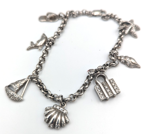 925 Silver Link Bracelet with 7x Silver Charms 20.30g