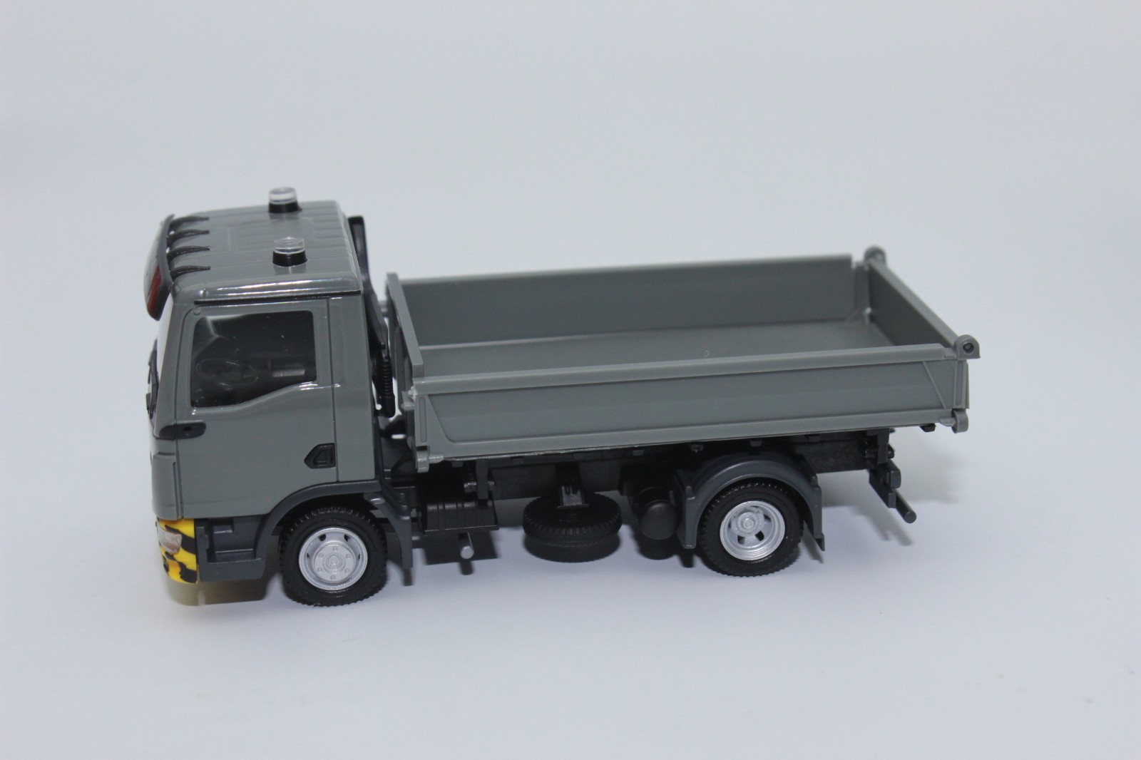 Herpa 319577 MAN TGL CC 3-Seiten-Kipper 2 achs grau H0 187 NEU OVP