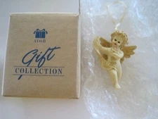 Avon Cherub Christmas Ornament W/ Bouquet Of Flowers