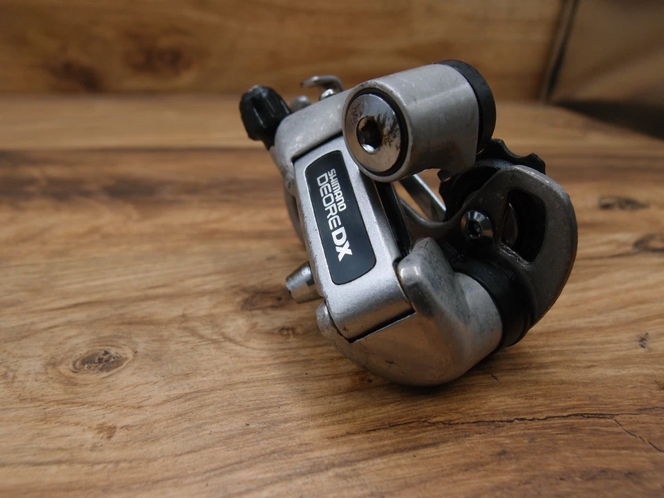 Desviador trasero MTB Shimano Deore DX VIA Japón RD-M650 7 velocidades jaula corta 1991 Foto 3 de 4