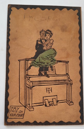 1907 LEATHER PC COUPLE PERCHED ON UPRIGHT PIANO TRY THIS ON YOUR PIANO W S HEAL - Picture 1 of 2