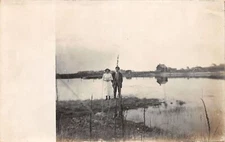 J65/ Tolley? North Dakota RPPC Postcard c1910 Man Woman Farm Barn 239