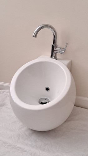 Nameeks Scarabeo 8100 Round Wall-Mounted Sink w/ Delta Faucet - White MSRP$850 - Picture 8 of 12